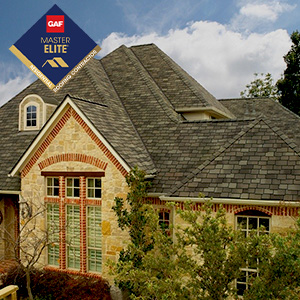 GAF Master Elite Logo on top of house with asphalt shingles